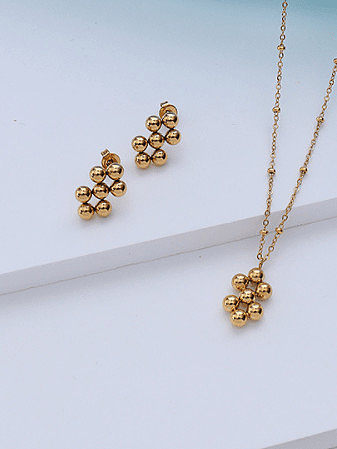Boucles d'oreilles et collier géométriques vintage en perle d'acier au titane