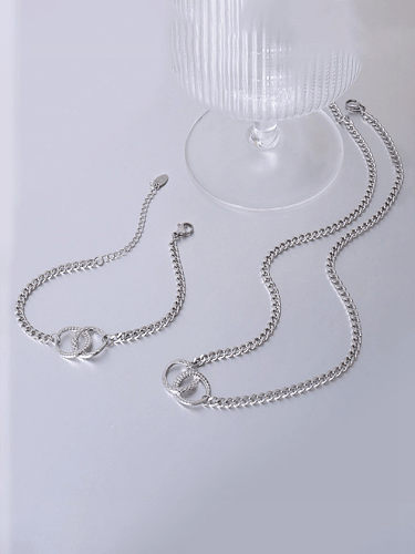 Conjunto de colar e bracelete geométrico minimalista de aço titânio
