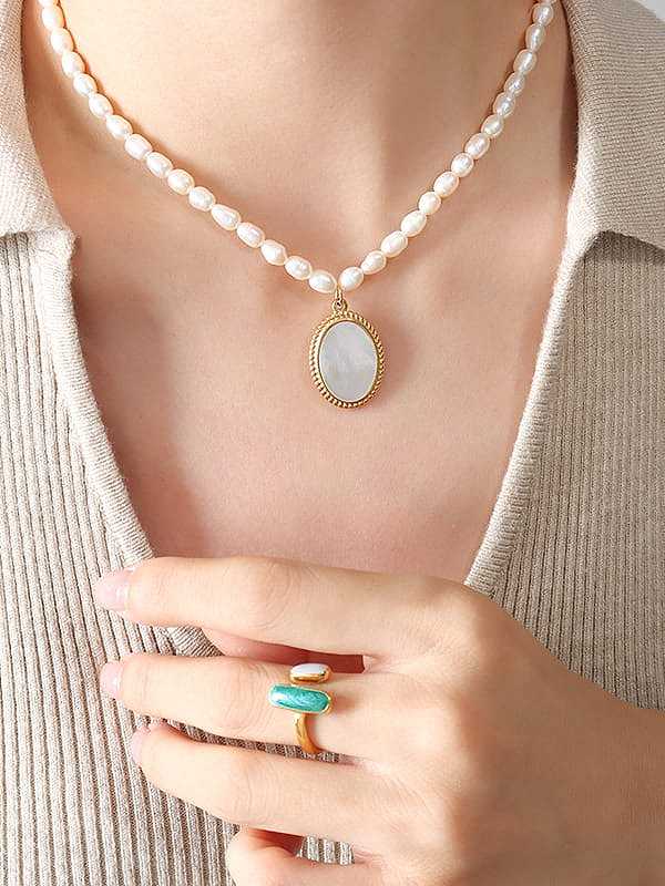 Collar vintage geométrico de perlas de agua dulce de acero titanio