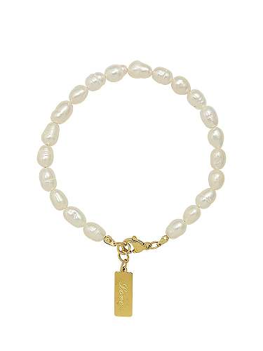 Bracelet minimaliste géométrique en acier au titane avec perle d'eau douce