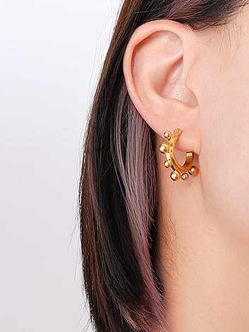 Boucles d'oreilles Huggie vintage géométriques en acier titane