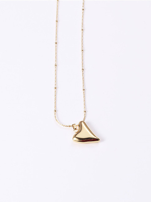 Titanio con collares de corazón liso simplista chapado en oro