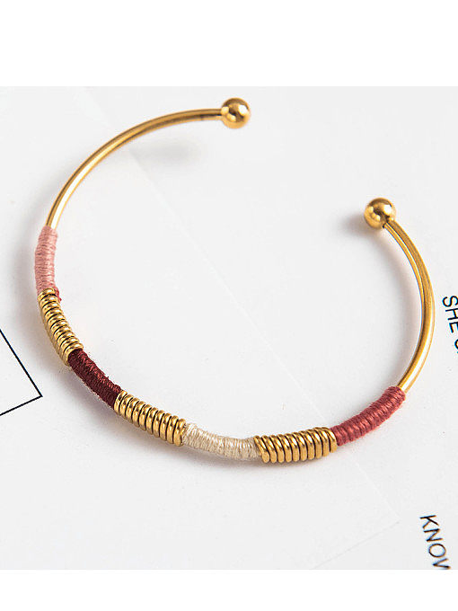 Offenes Armband im Ethno-Stil mit farbigen Fäden aus Edelstahl