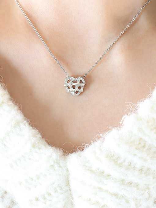 Conjunto de colar e brinco de coração minimalista de aço titânio