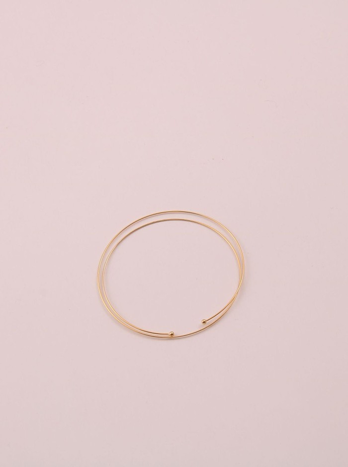 Titane avec bracelets ronds multicouches simplistes plaqués or
