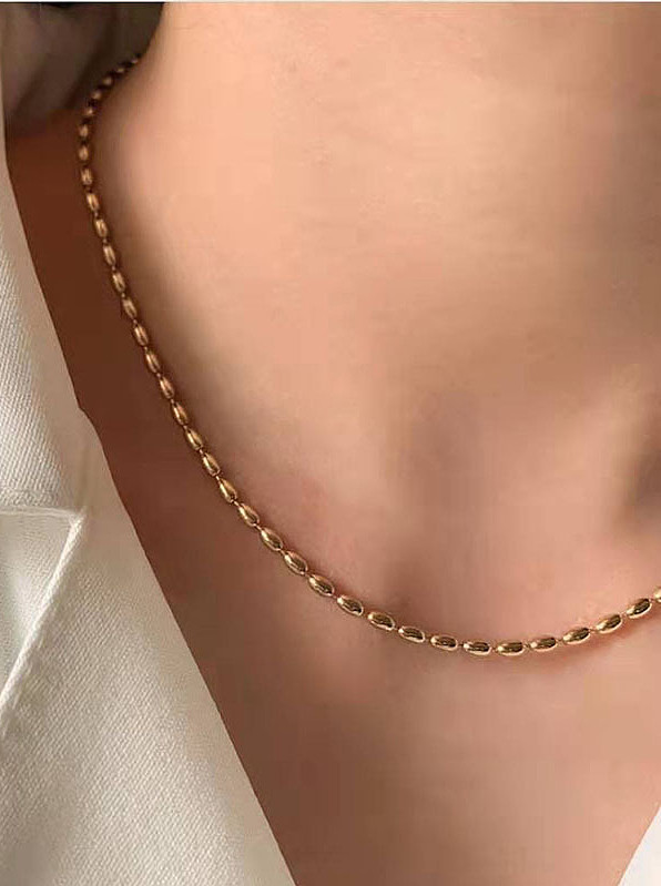 Collares de titanio con cuentas simplistas chapadas en oro