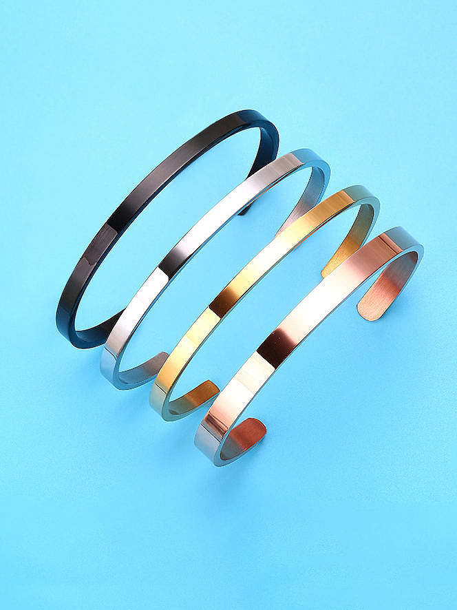 Brazalete minimalista geométrico de acero titanio