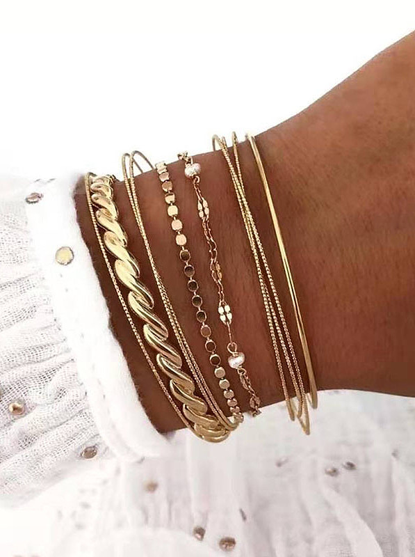 Titane avec bracelets lisses simplistes plaqués or
