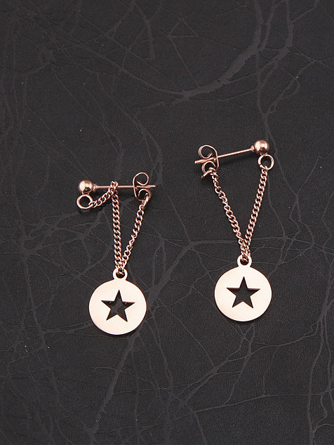Boucles d'oreilles pendantes en titane à motif rond et motif étoile