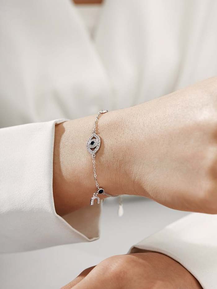 Zierliches, verstellbares Armband aus 925er-Sterlingsilber mit Zirkonia und bösem Blick