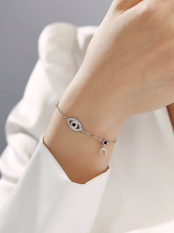 Zierliches, verstellbares Armband aus 925er-Sterlingsilber mit Zirkonia und bösem Blick