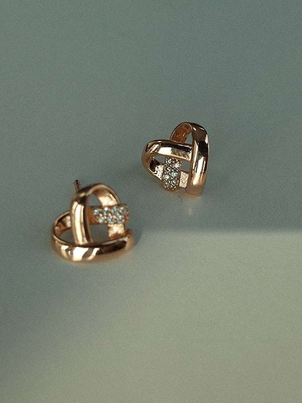 Boucle d'oreille Huggie minimaliste en forme de cœur avec strass en argent sterling 925