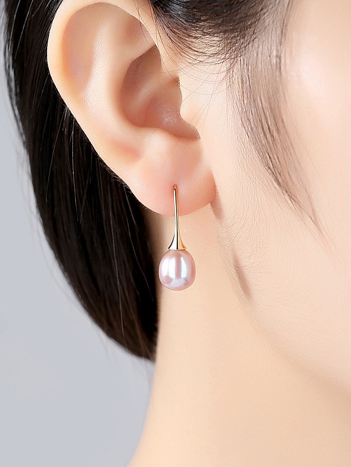 Minimalistische Ohrringe aus Sterlingsilber mit natürlichen Süßwasserperlen