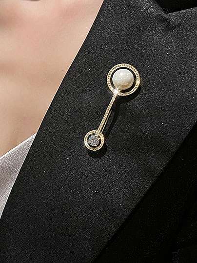 Broche minimaliste ronde en laiton imitation perle