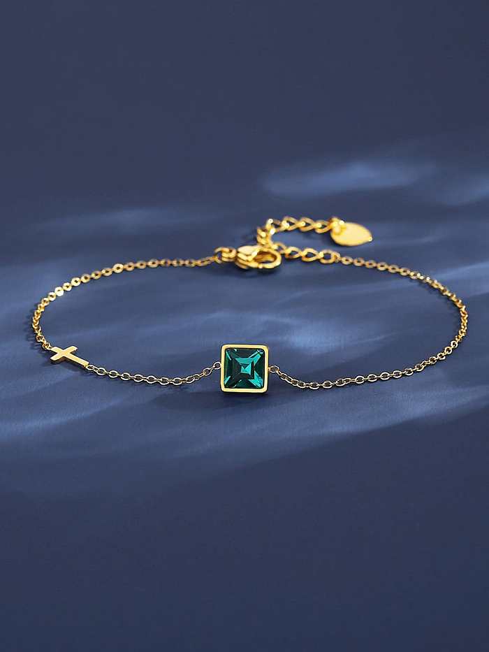 Geometrisches, zierliches Armband aus Titanstahl mit kubischem Zirkonia in Grün
