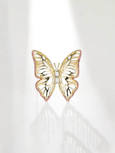 Broche de mariposa de diamantes de imitación de latón