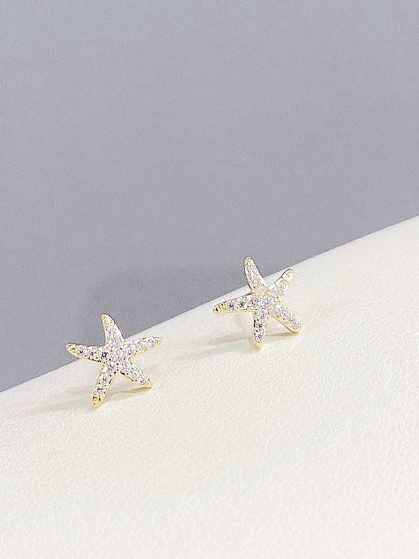 Aretes minimalistas de latón con estrella de mar y perla de imitación