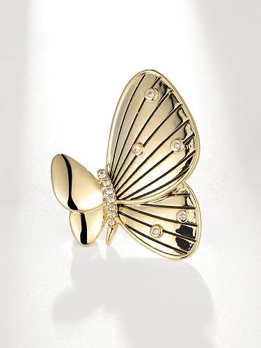 Broche minimalista de borboleta de zircônia cúbica de latão