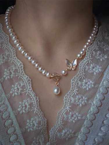 Collier de perles vintage en forme de papillon et de perles d'eau douce