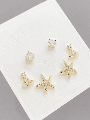 Aretes minimalistas de latón con estrella de mar y perla de imitación