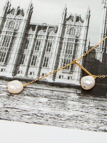Minimalistische Lasso-Halskette aus Messing mit Süßwasserperlen und Quasten