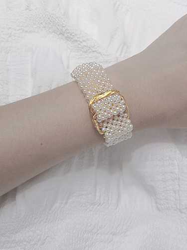 Bracelet jonc géométrique luxe perle d'eau douce en laiton