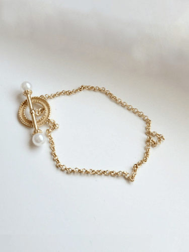 Armband aus synthetischer Perle aus reinem Silber mit 18 Karat Gold