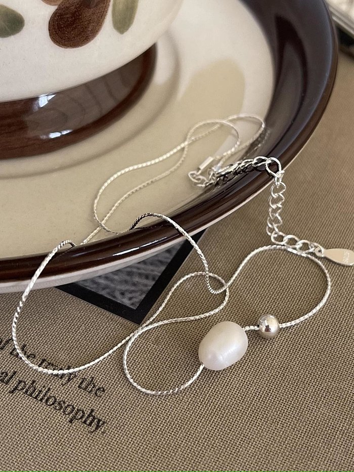 Unregelmäßige minimalistische Halskette aus 925er Sterlingsilber mit Imitationsperlen