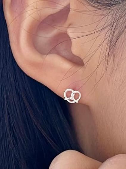Boucles d'oreilles minimalistes en argent sterling 925 avec nœud papillon creux