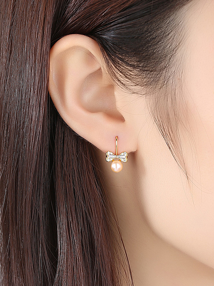 Pure silver natural freshwater pearl cute bow tie studs