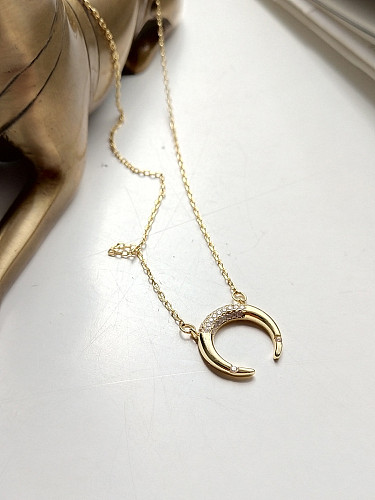 Sterling silver zricon curved moon necklace