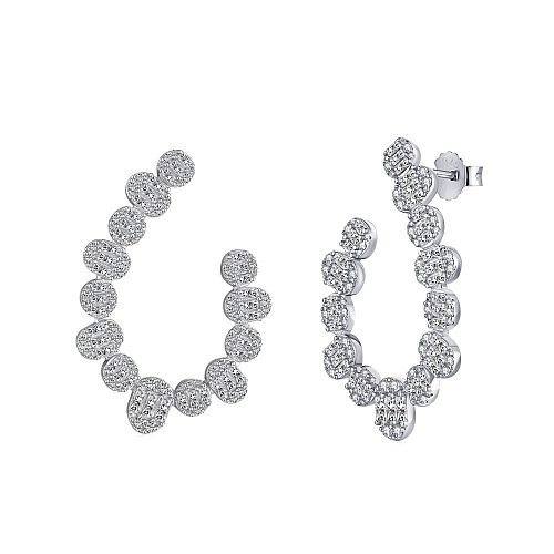 Boucle d'oreille brillante en forme de U avec zircone