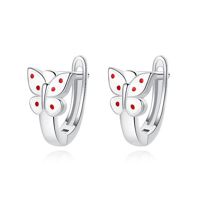Boucles d'oreilles créoles papillon argentées pour enfants