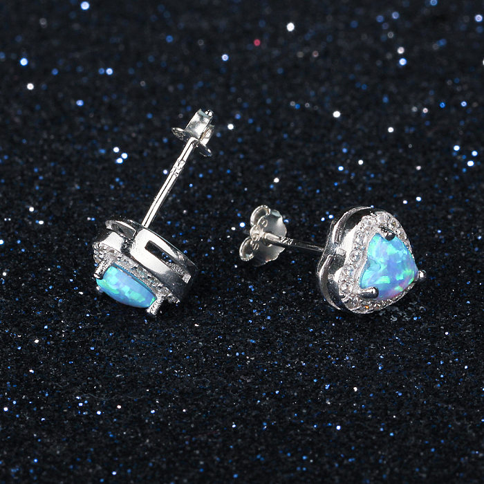 Boucle d'oreille à tige en opale et cœur bleu en zircone