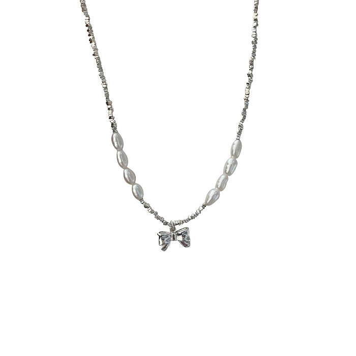 Pearl Crushed Silver Bow Pendant Necklaces