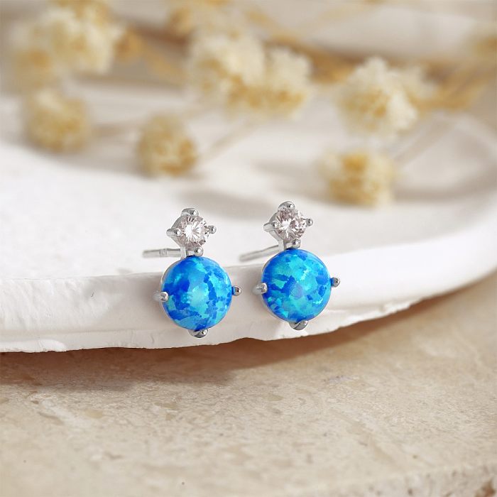 Boucle d'oreille à tige en opale et zircone brillante