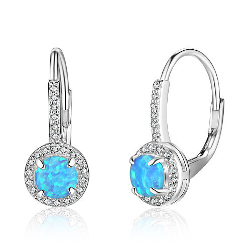 Boucle d'oreille créole en opale bleue et zircone