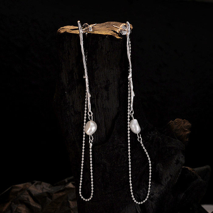 Einzigartiger Ohrstecker mit Perlenquasten und Perlen
