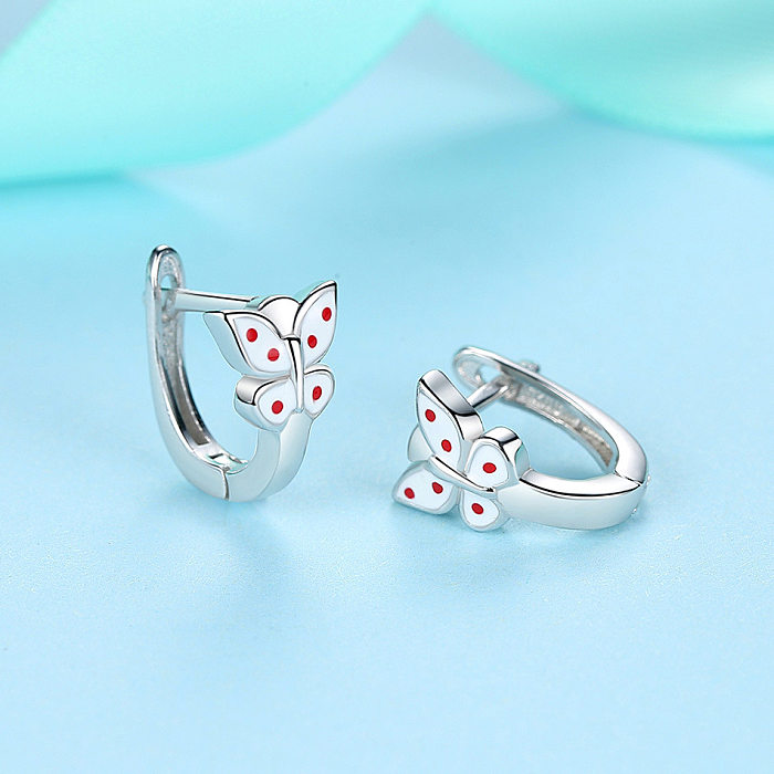 Boucles d'oreilles créoles papillon argentées pour enfants
