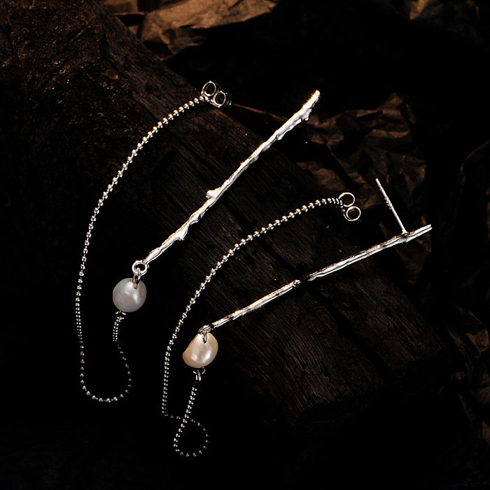 Einzigartiger Ohrstecker mit Perlenquasten und Perlen