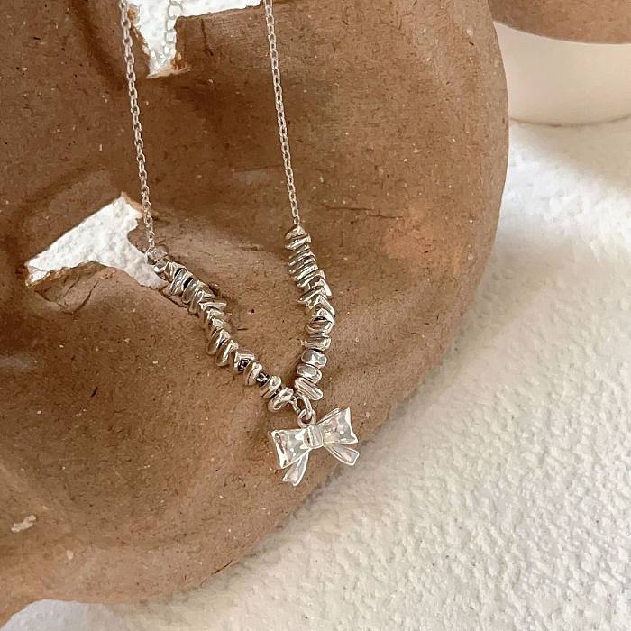 Mini Crash Silver Bow Pendant Necklaces