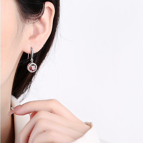 Boucles d'oreilles pendantes avec pierre d'anniversaire en zircone rouge