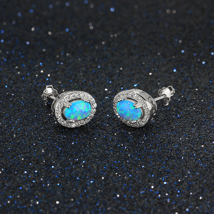 Boucle d'oreille vintage ovale en opale bleue