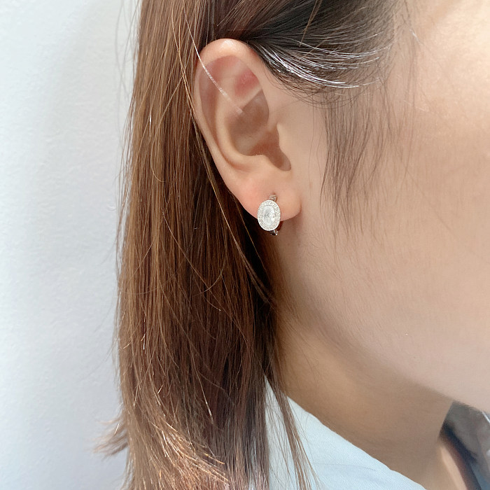 Silver Cubic Zirconia Oval Huggie Earring
