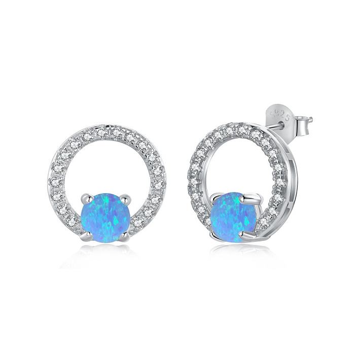 Boucle d'oreille à tige en opale et cercle de zircone