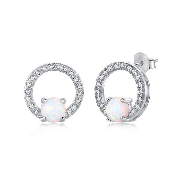 Boucle d'oreille à tige en opale et cercle de zircone