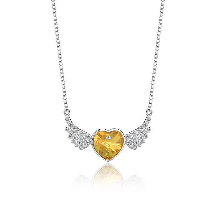Collier avec pendentif en forme d'aile et de zircone cubique, cristaux autrichiens, cœur d'amour