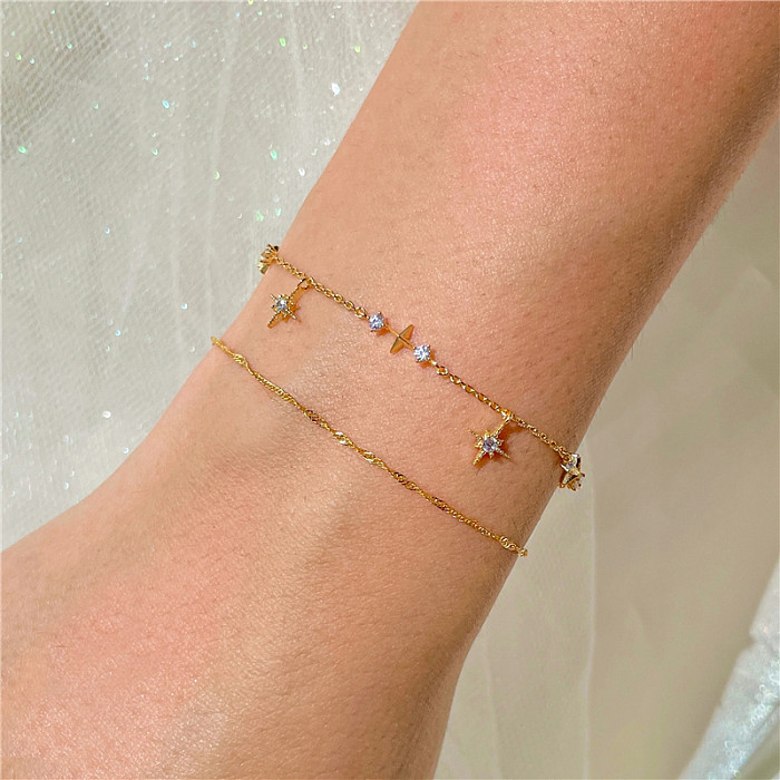 Pulsera de cadena en capas con estrella de circonitas cúbicas plateadas