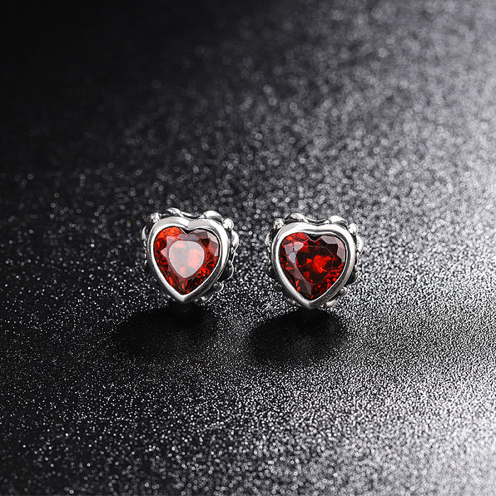 Boucles d'oreilles vintage en forme de cœur rouge avec zircone