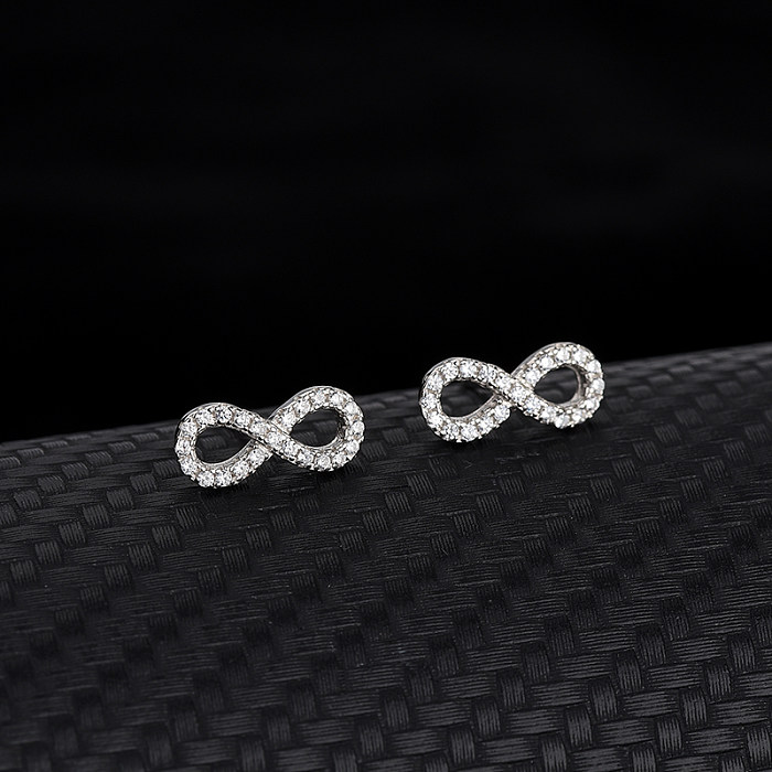 Conjunto de collar con aretes infinitos de circonita cúbica plateada